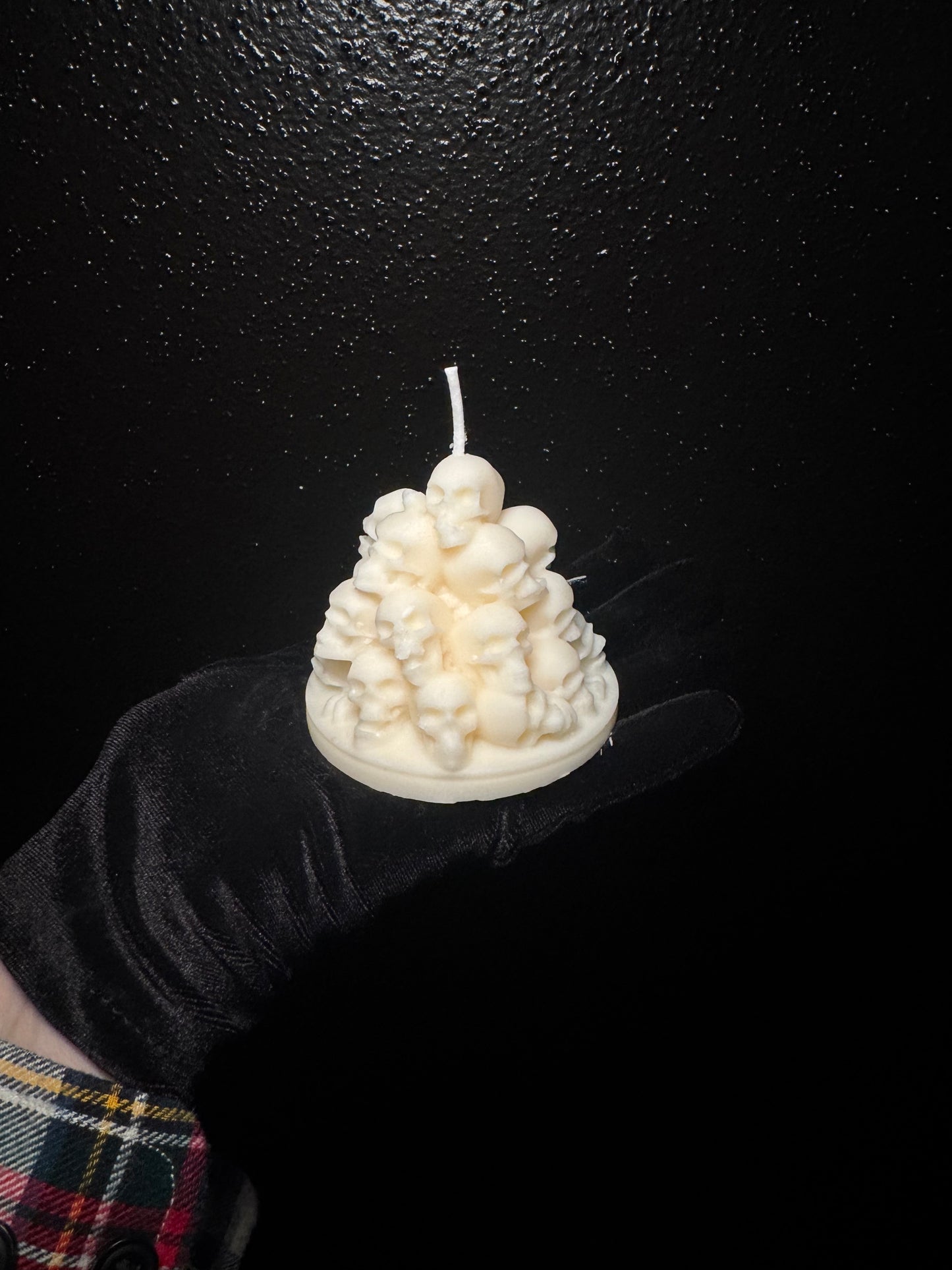 Pile of skulls candle