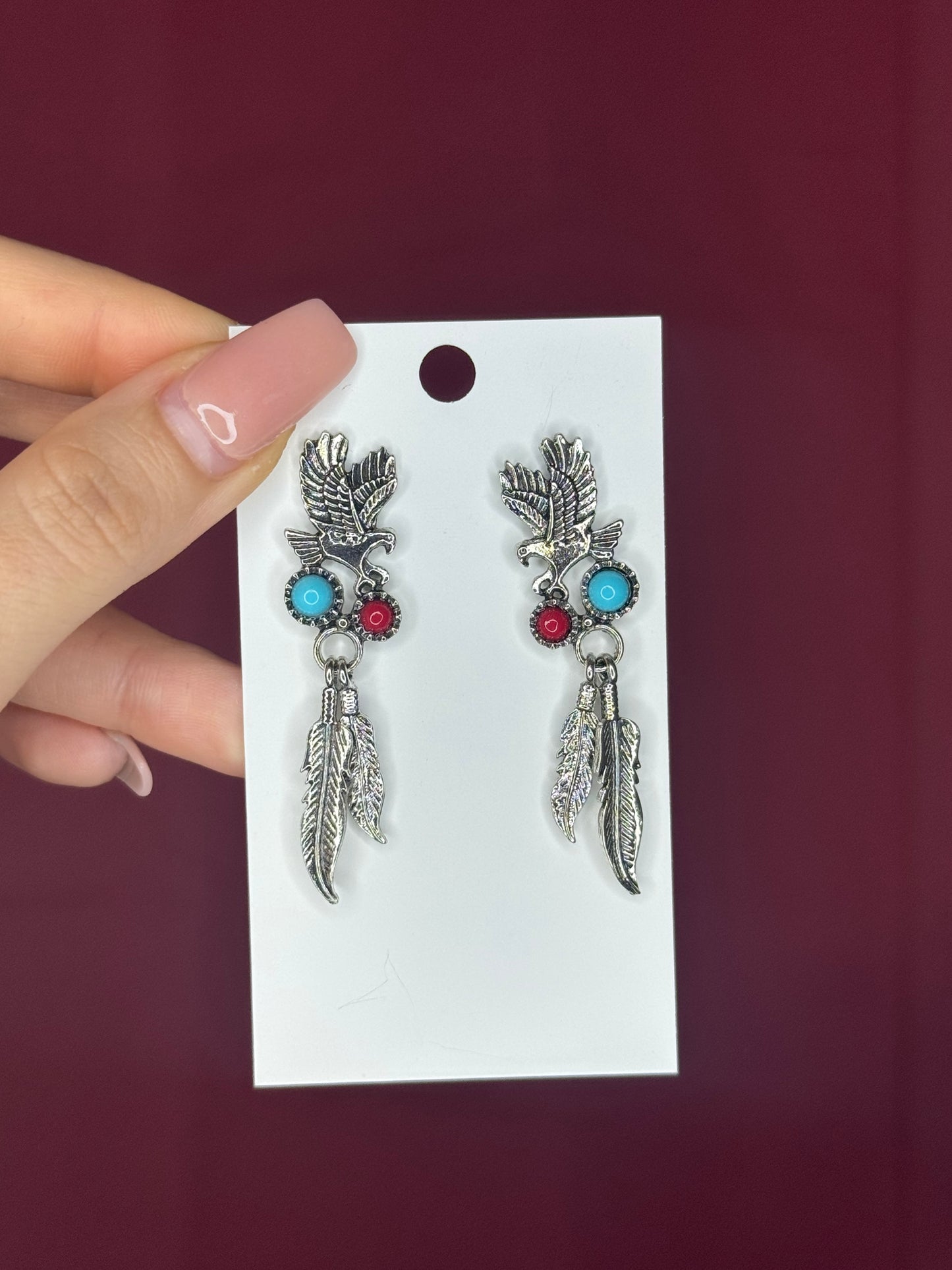Bird and feathers earrings