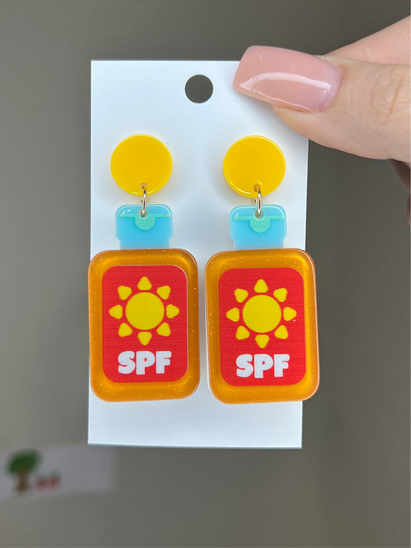 Spf sunblock earrings