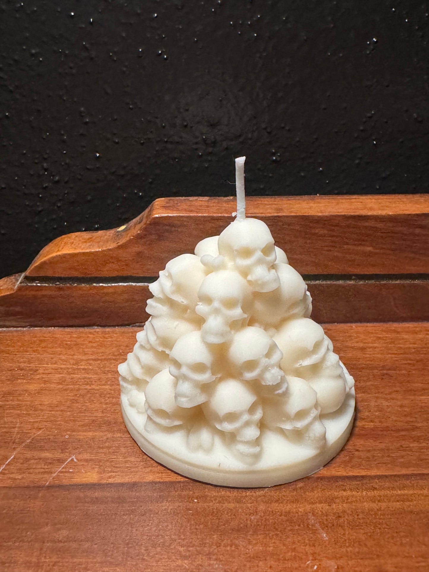 Pile of skulls candle